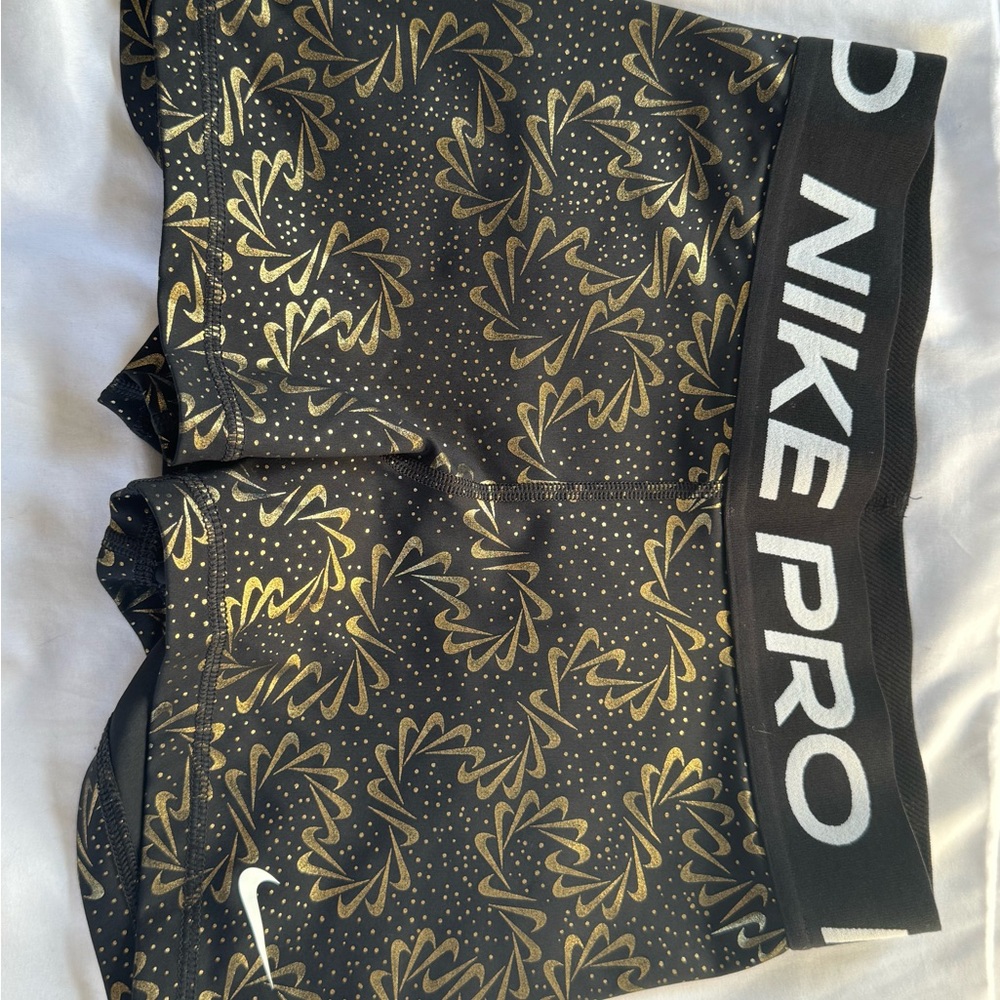 Nike Pro Black Shorts with Gold Accents